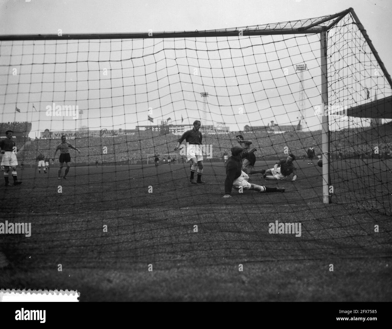 Coen Moulijn in action in front of the Danish goal, November 4, 1956, sports, soccer, The Netherlands, 20th century press agency photo, news to remember, documentary, historic photography 1945-1990, visual stories, human history of the Twentieth Century, capturing moments in time Stock Photo