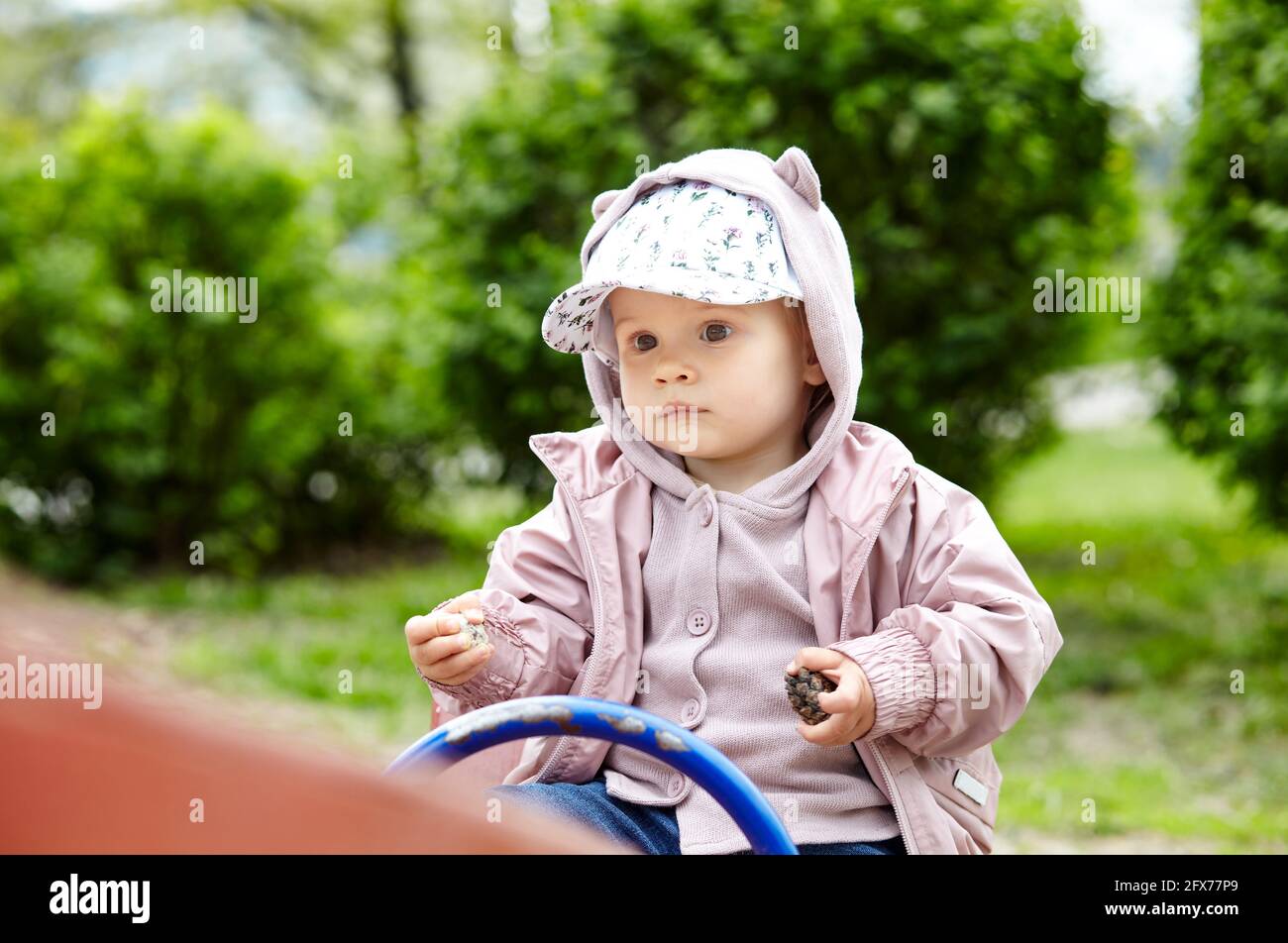 Child playing on outdoor playground. Healthy activity for children