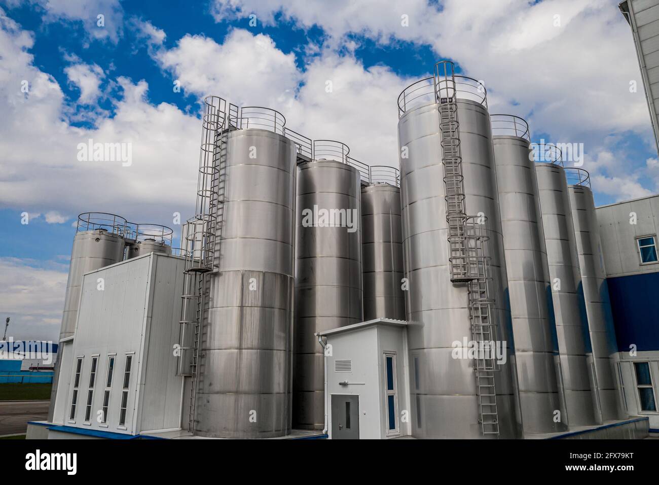 stainless steel tanks at a food processing plant top view Stock Photo
