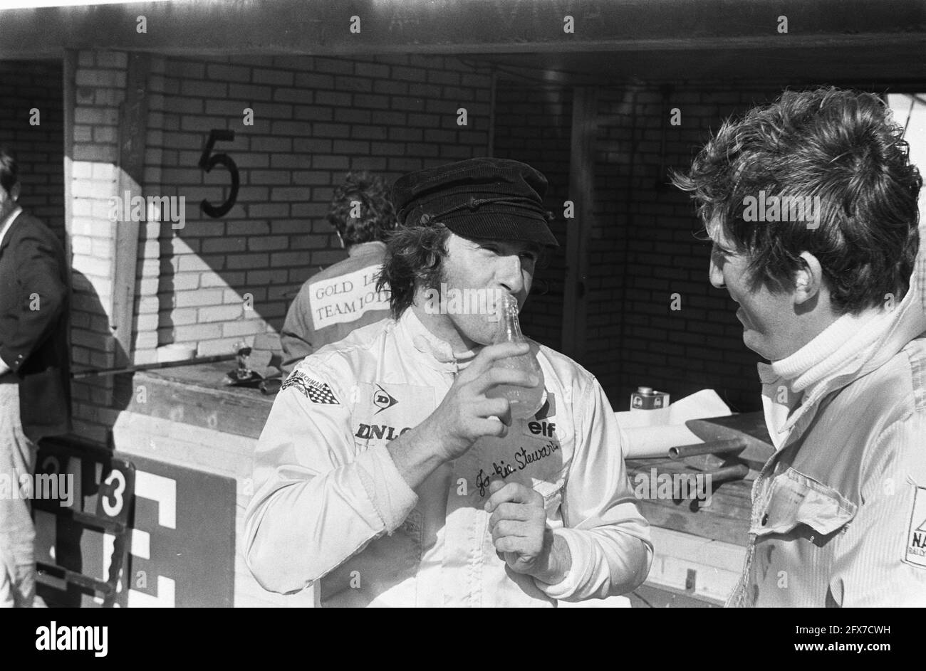 Jackie Stewart drinking a bottle of lemonade, June 19, 1969, auto drivers, bottles, The Netherlands, 20th century press agency photo, news to remember, documentary, historic photography 1945-1990, visual stories, human history of the Twentieth Century, capturing moments in time Stock Photo