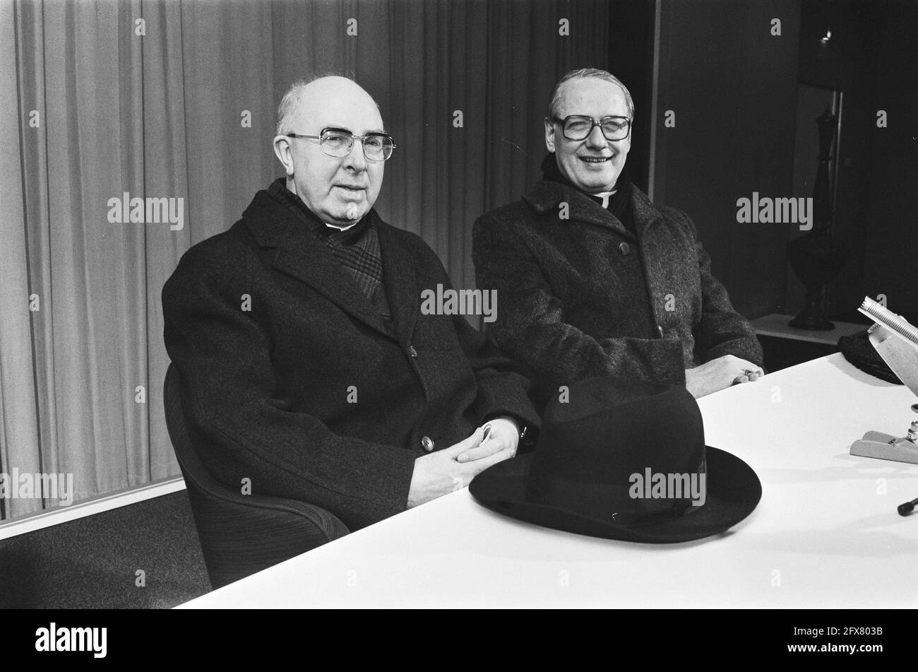 Arrival at Schiphol from Rome; Cardinal Willebrands and Bishop Simonis; Cardinal Willebrands (l) and Bishop Simonis during press conference, January 22, 1979, arrivals, cardinals, press conferences, The Netherlands, 20th century press agency photo, news to remember, documentary, historic photography 1945-1990, visual stories, human history of the Twentieth Century, capturing moments in time Stock Photo