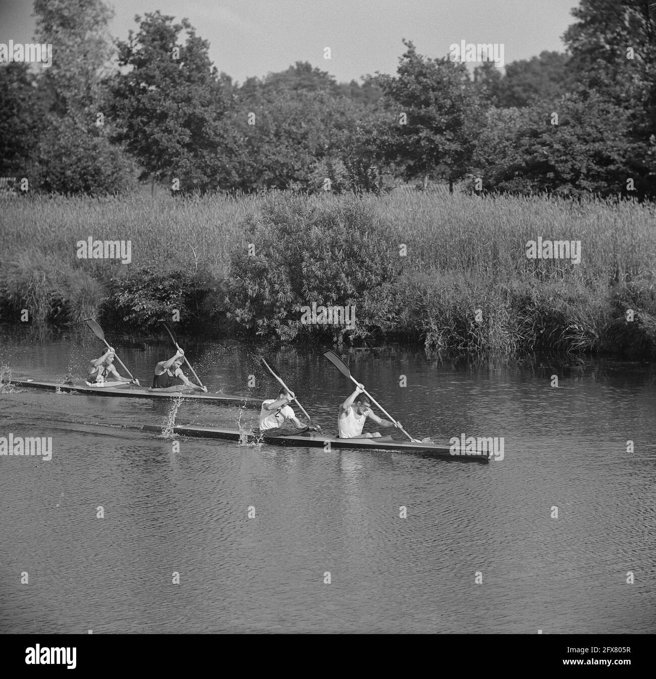 Championship of the Netherlands Canoe 10,000m Men on Twenthe Canal at Eefde. Lagrand, Kracht, Baan, van der Ster, Weyzen, Knuppe, Leeuwerik and Beunder, June 29, 1963, Championships, canoers, The Netherlands, 20th century press agency photo, news to remember, documentary, historic photography 1945-1990, visual stories, human history of the Twentieth Century, capturing moments in time Stock Photo