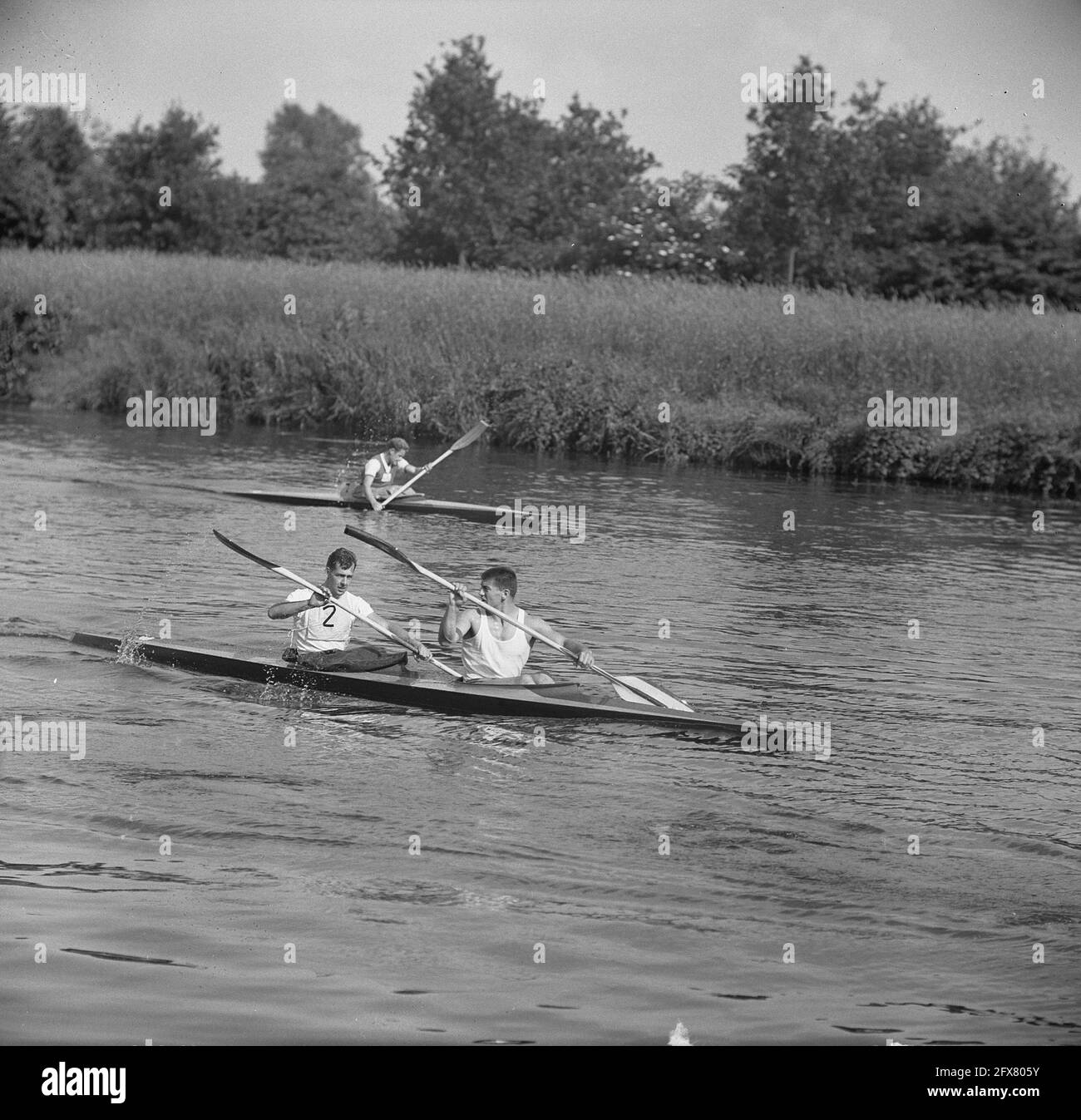 Championship of the Netherlands Canoe 10,000m Men on Twenthe Canal at Eefde. Lagrand, Kracht, Baan, van der Ster, Weyzen, Knuppe, Leeuwerik and Beunder, June 29, 1963, Championships, canoers, The Netherlands, 20th century press agency photo, news to remember, documentary, historic photography 1945-1990, visual stories, human history of the Twentieth Century, capturing moments in time Stock Photo