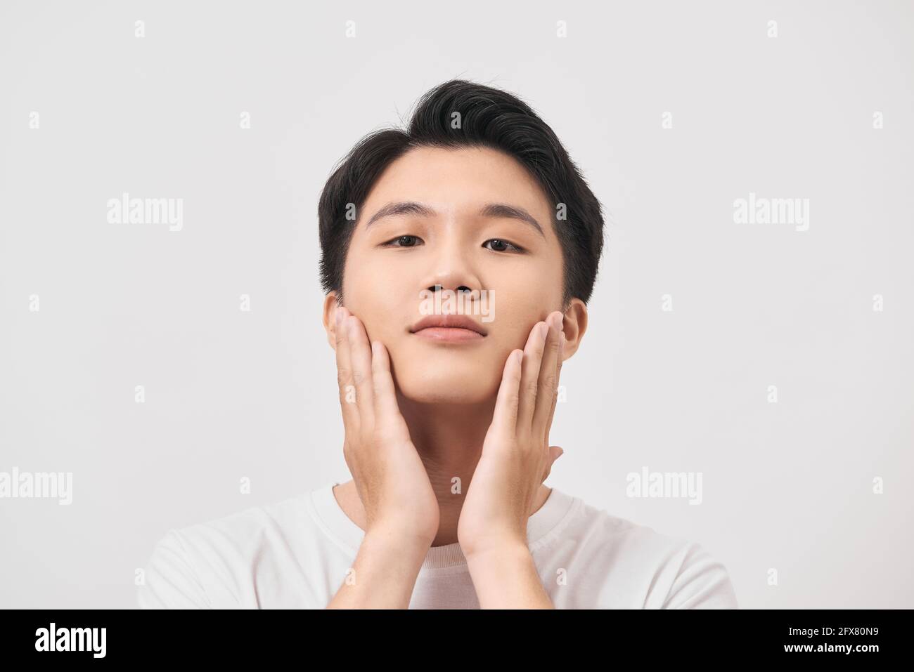 Men Face Care. Man Touching Smooth Skin After Shaving Stock Photo Alamy