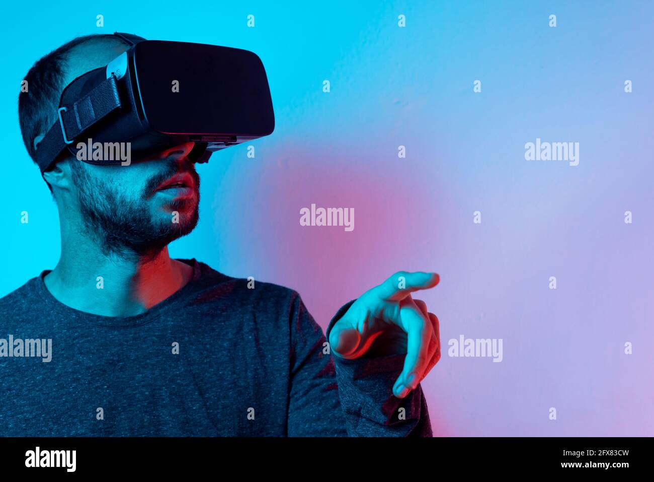 Man Using Something Man raising hands using tech hi-res stock photography and images - Alamy