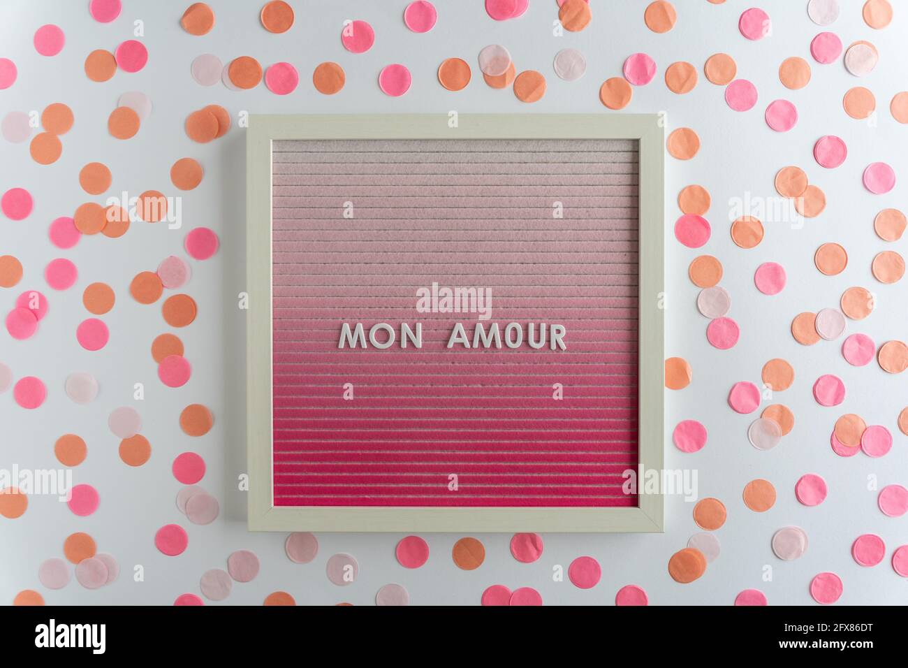 Pink Letterboard Words That Spell Mon Amour Translation My Love On A White Background With Colorful Confetti Horizontal Stock Photo Alamy