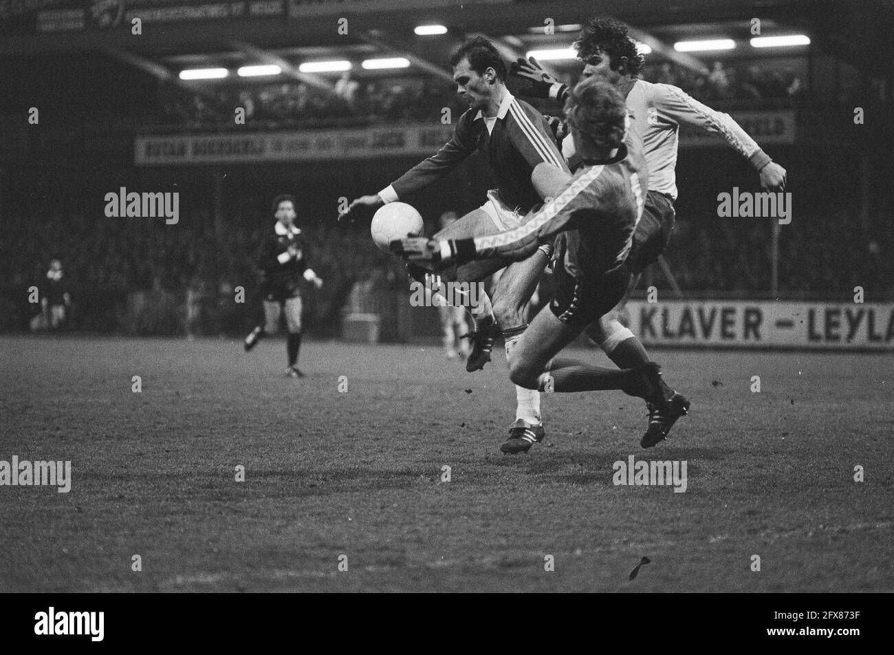 AZ 67 against FC Utrecht 1-0; from left to right Metgod (AZ), goalkeeper van Breukelen and van Hanegem (Utrecht), April 5, 1980, goalkeepers, sports, soccer, The Netherlands, 20th century press agency photo, news to remember, documentary, historic photography 1945-1990, visual stories, human history of the Twentieth Century, capturing moments in time Stock Photo