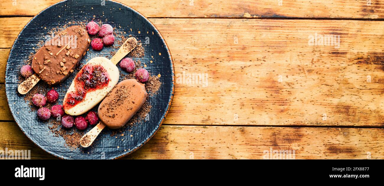 Popsicle ice cream with chocolate and cherry.Ice cream sticks Stock Photo