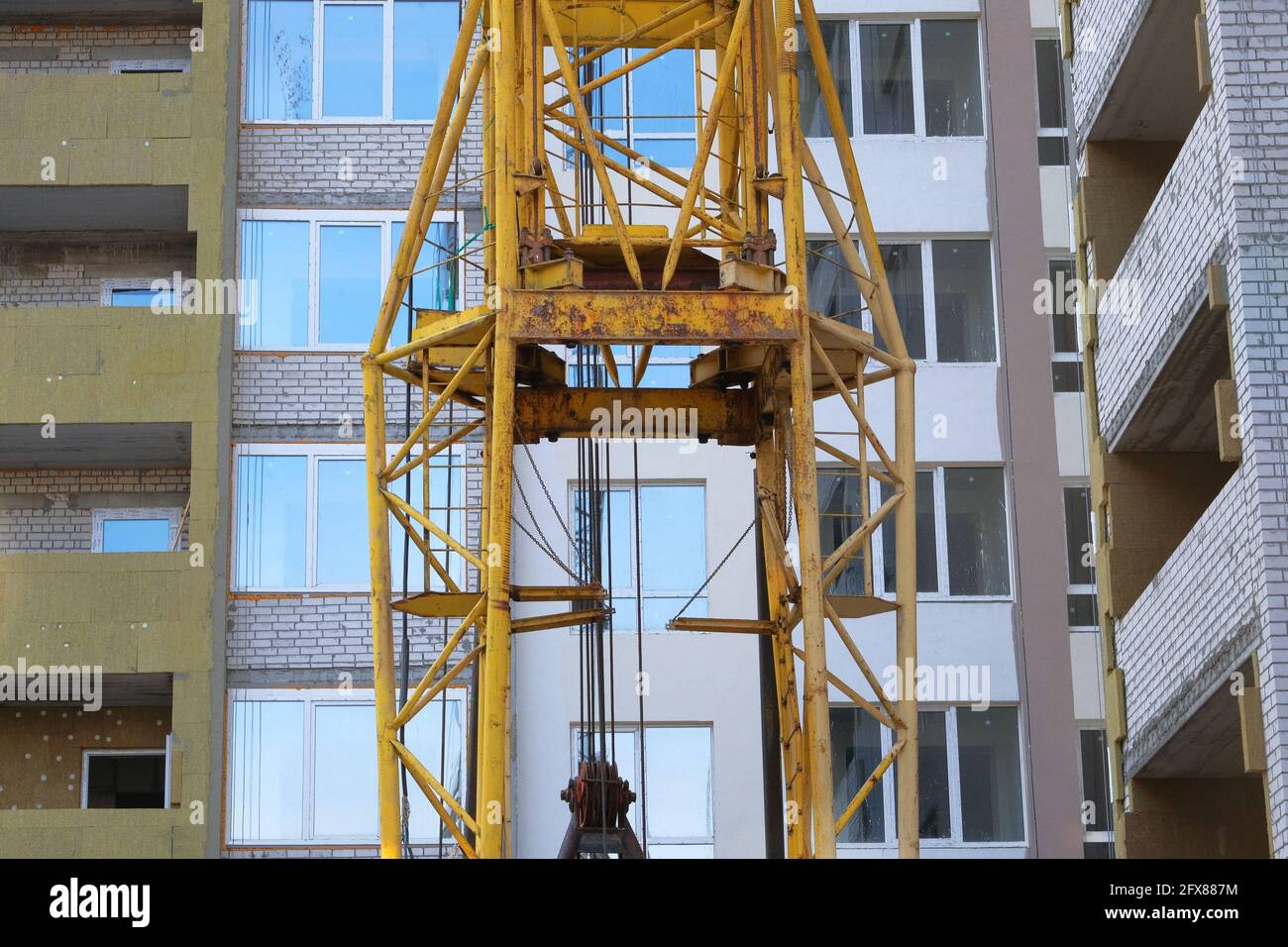 Construction site. Building site of new home. Mineral wool or fiberglass for house heat insulation, isolation material. Stock Photo