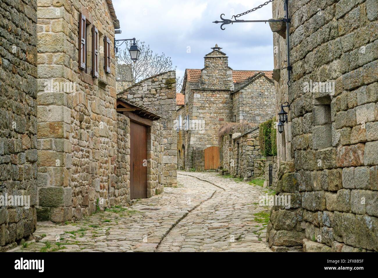 France, Lozere, La Garde Guerin, labelled Les Plus Beaux Villages de France (The Most Beautiful Villages of France), cobblestone alley // France, Lozè Stock Photo