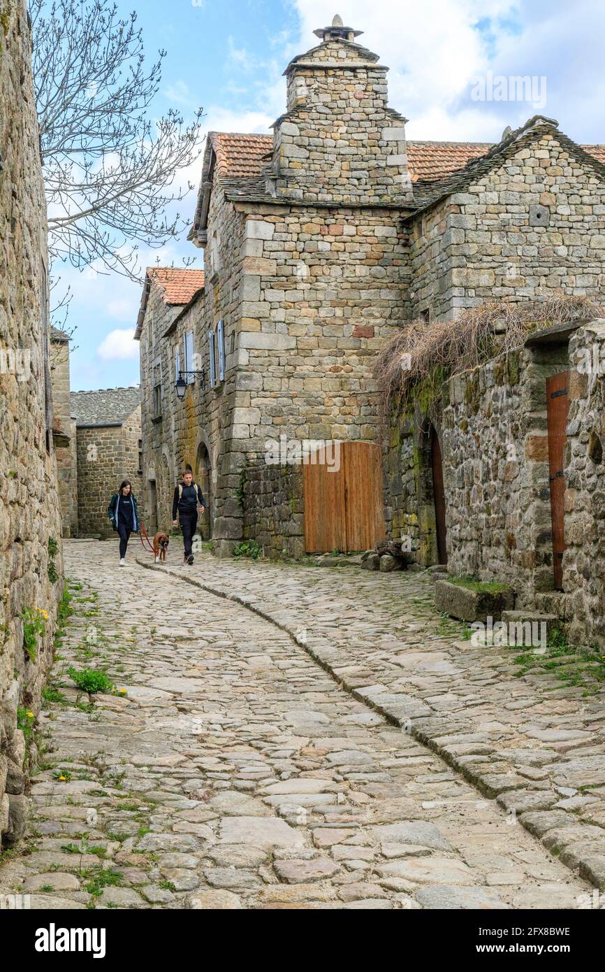 France, Lozere, La Garde Guerin, labelled Les Plus Beaux Villages de France (The Most Beautiful Villages of France), cobblestone alley // France, Lozè Stock Photo
