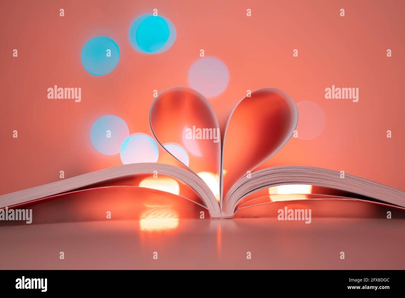 heart book with magic lights stock photo Stock Photo