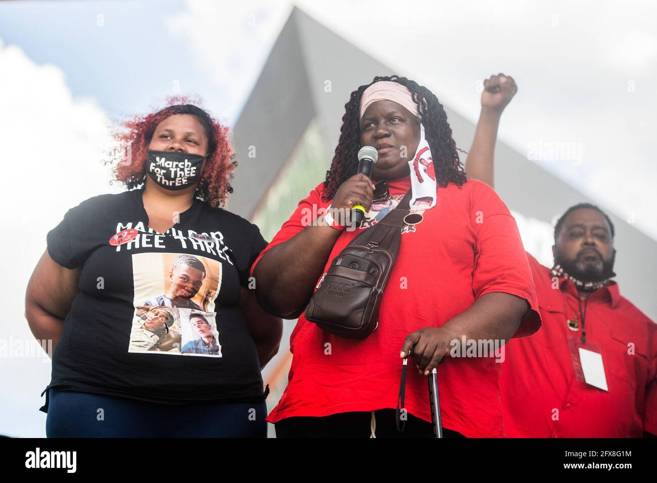 Tracy Cole, the mother of Alvin Cole speaks at Commons Park during the