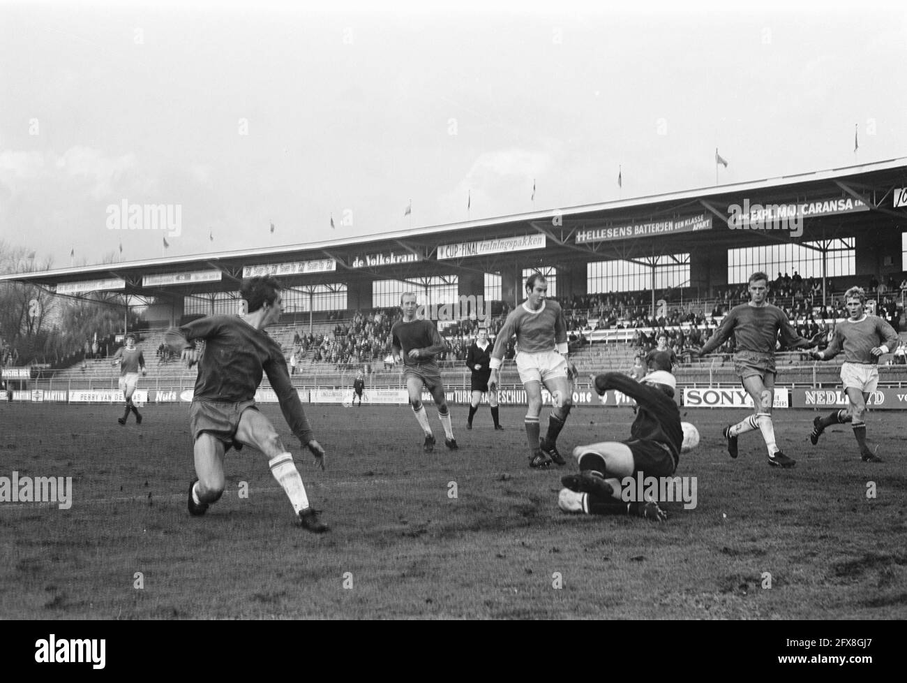 EDO against Ajax 0-4 in KNVB cup. Cruijff to the ball Date: 14 December  1969 Location: Haarlem Keywords: sport, football Personal name: Cruijff,  Johan Institution name: Nijssen, [ ] Stock Photo - Alamy