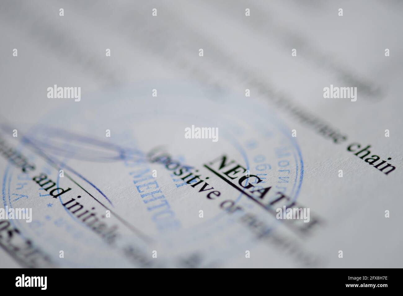 New york, USA - May 26, 2021: Negative covid test result on official document macro close up view Stock Photo