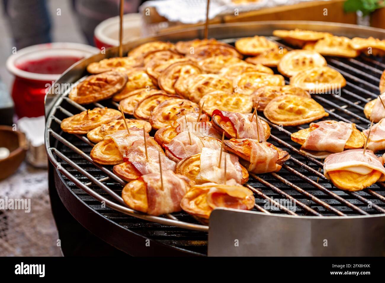 Traditional polish street food, sheep cheese, lots of smoked oscypki,  delicious tasty oscypek with bacon on grill, sold on a local town market  stall Stock Photo - Alamy