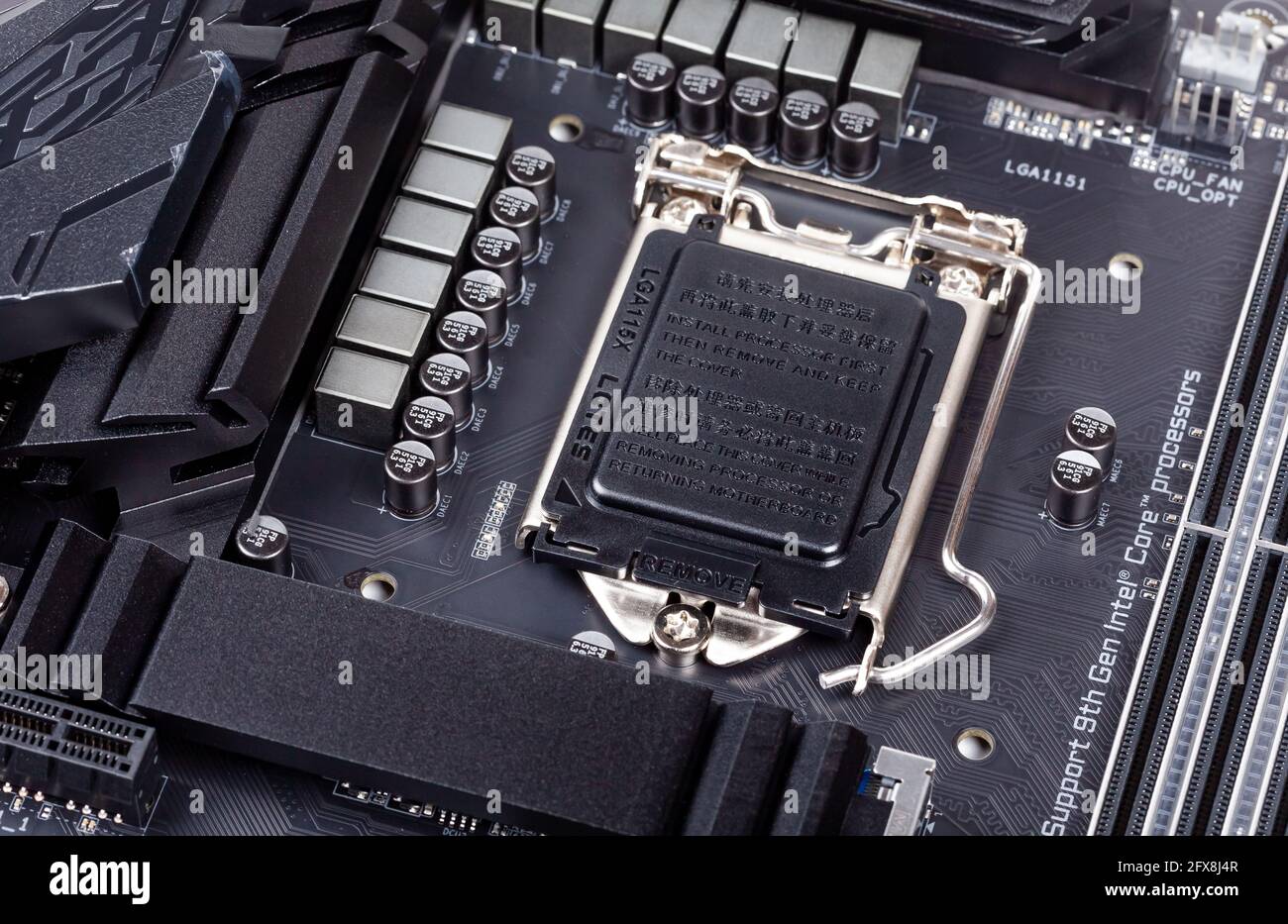 Z390 Aorus Pro Wifi high end motherboard, LGA 1115 x socket, empty CPU slot with plastic lid, socket cover on, product shot, top view, from above, pc Stock Photo