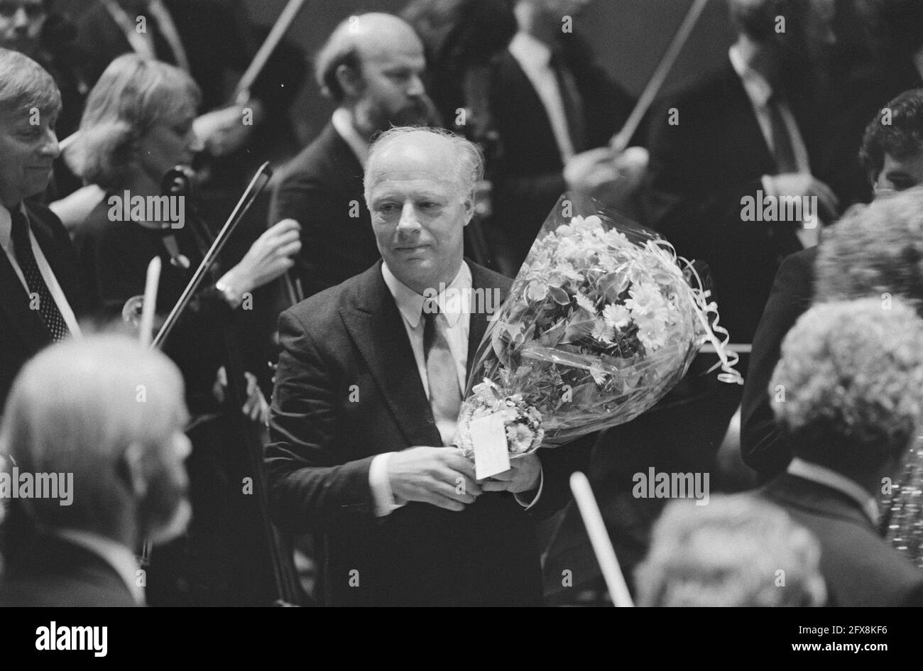 Bernhard Haitink takes leave as chief conductor of Concertgebouw Orchestra; Bernhard Haitink, April 17, 1988, FAREWELL, FLOWS, conductors, orchestras, The Netherlands, 20th century press agency photo, news to remember, documentary, historic photography 1945-1990, visual stories, human history of the Twentieth Century, capturing moments in time Stock Photo