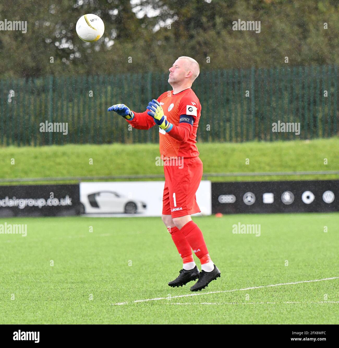 Bridgend, Wales. 10 October, 2020. Goalkeeper Paul Harrison of The New Saints controls the ball during the JD Cymru Premier match between Penybont and The New Saints at the SDM Glass Stadium in Bridgend, Wales, UK on 10, October 2020. Sporting stadiums around the UK remain under strict restrictions due to the Coronavirus Pandemic as Government social distancing laws prohibit fans inside venues resulting in games being played behind closed doors. Credit: Duncan Thomas/Majestic Media. Stock Photo