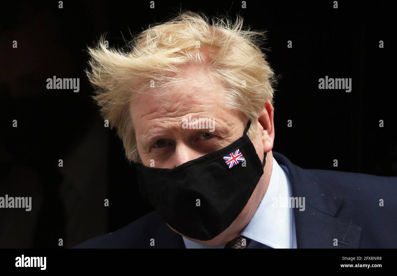 London, England, UK. 26th May, 2021. UK Prime Minister BORIS JOHNSON leaves 10 Downing Street ahead of the weekly Prime Minister's Questions session in the House of Commons as his former chief adviser Dominic Cummings testifies against his government in the joint inquiry of the Health and Social Care Committee and Science and Technology Committee on coronavirus pandemic response. Credit: Tayfun Salci/ZUMA Wire/Alamy Live News Stock Photo