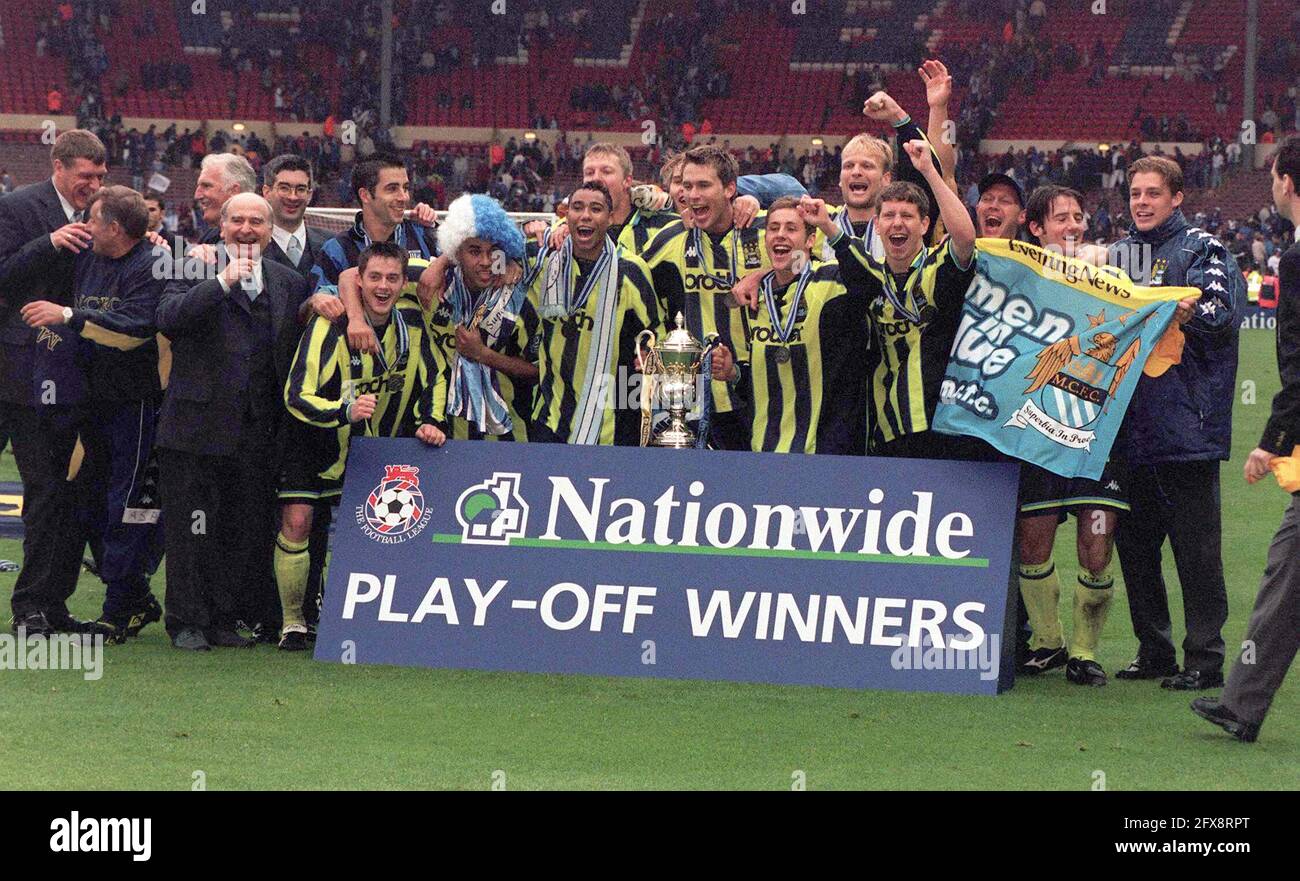 File photo dated 30-05-1999 of Manchester City with the 2nd Division play-off trophy, won after they defeated Gillingham in a penalty shoot-out at Wembley. Issue date: Wednesday May 26, 2021. Stock Photo