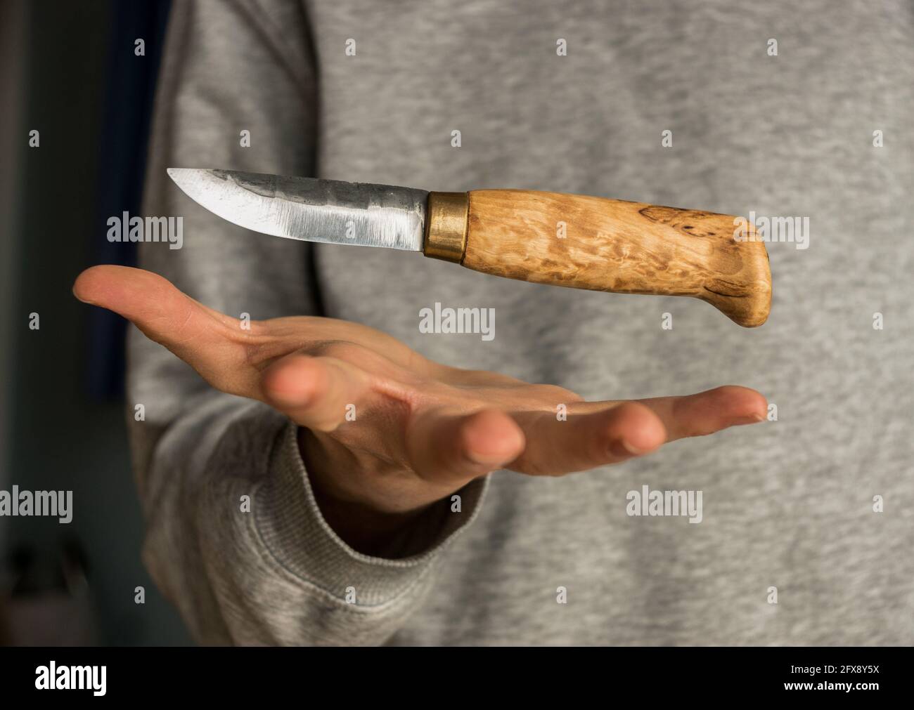 Floating nordic knife Stock Photo - Alamy