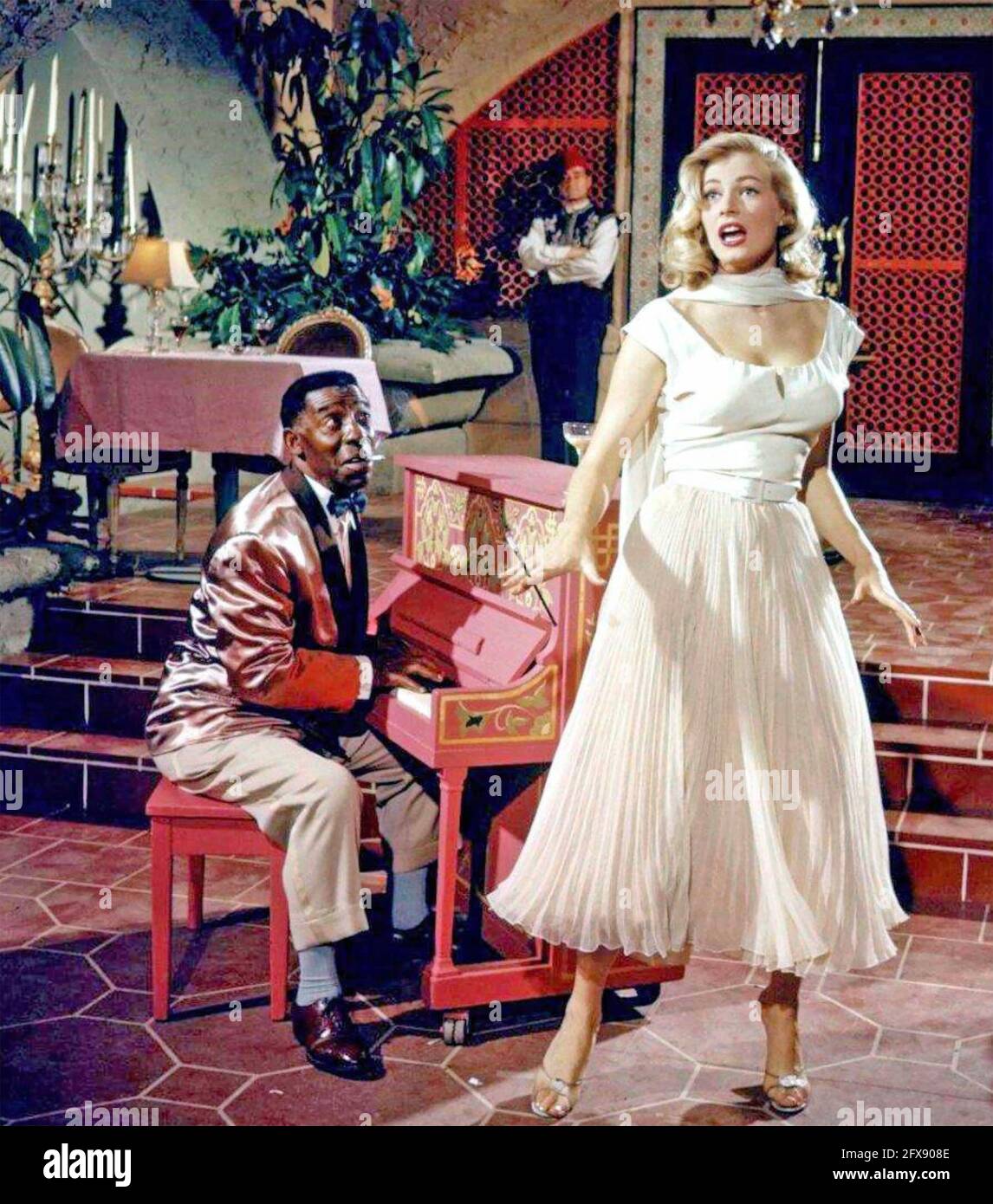 ANITA EKBERG  (1931-2015) Swedish film actress as Katrina in the 1955 Warner Bros. TV version of the film Casablanca with Clarence Muse on piano Stock Photo