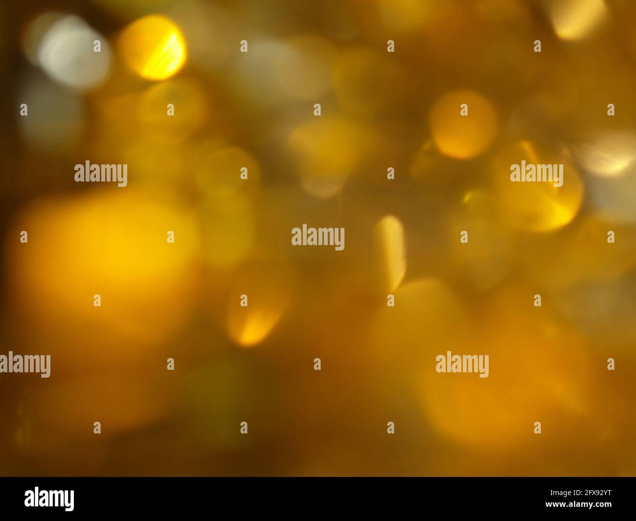 Abstract golden bokeh lights background Stock Photo - Alamy