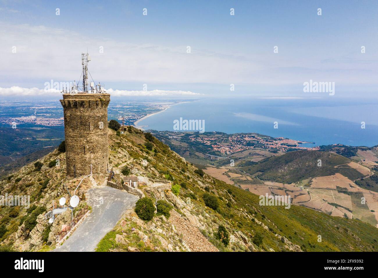 France, Pyrenees Orientales, Cote Vermeille, Port Vendres, the Tour Madeloc, Madeloc tower and the Cote Vermeille (aerial view) // France, Pyrénées Or Stock Photo