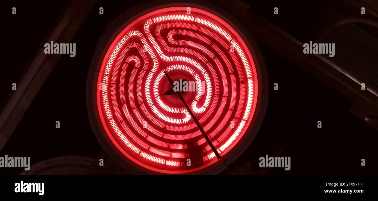 Kitchen stove burner inside electrical resistance thermostat Stock