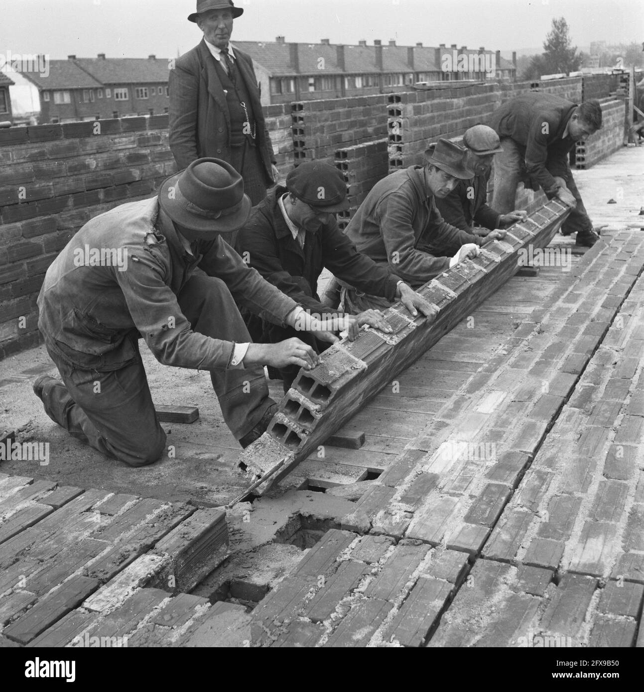 Construction workers at work in Arnhem], May 6, 1946