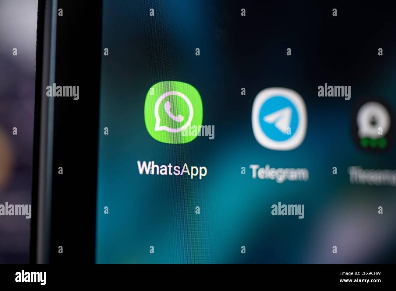 Berlin, Germany. 28th Apr, 2021. The logo of the messenger app Whatsapp is seen on the screen of a smartphone. WhatsApp is taking legal action against new Indian government rules that require the messaging service to identify and track the originator of private chat messages. (to dpa "WhatsApp sues India's government - wants more privacy") Credit: Fabian Sommer/dpa/Alamy Live News Stock Photo