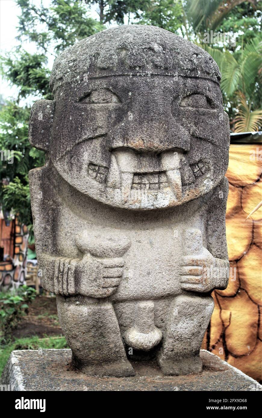 Ancient sculpture from burial site placed in the main square, San Agustin, Colombia, South America Stock Photo