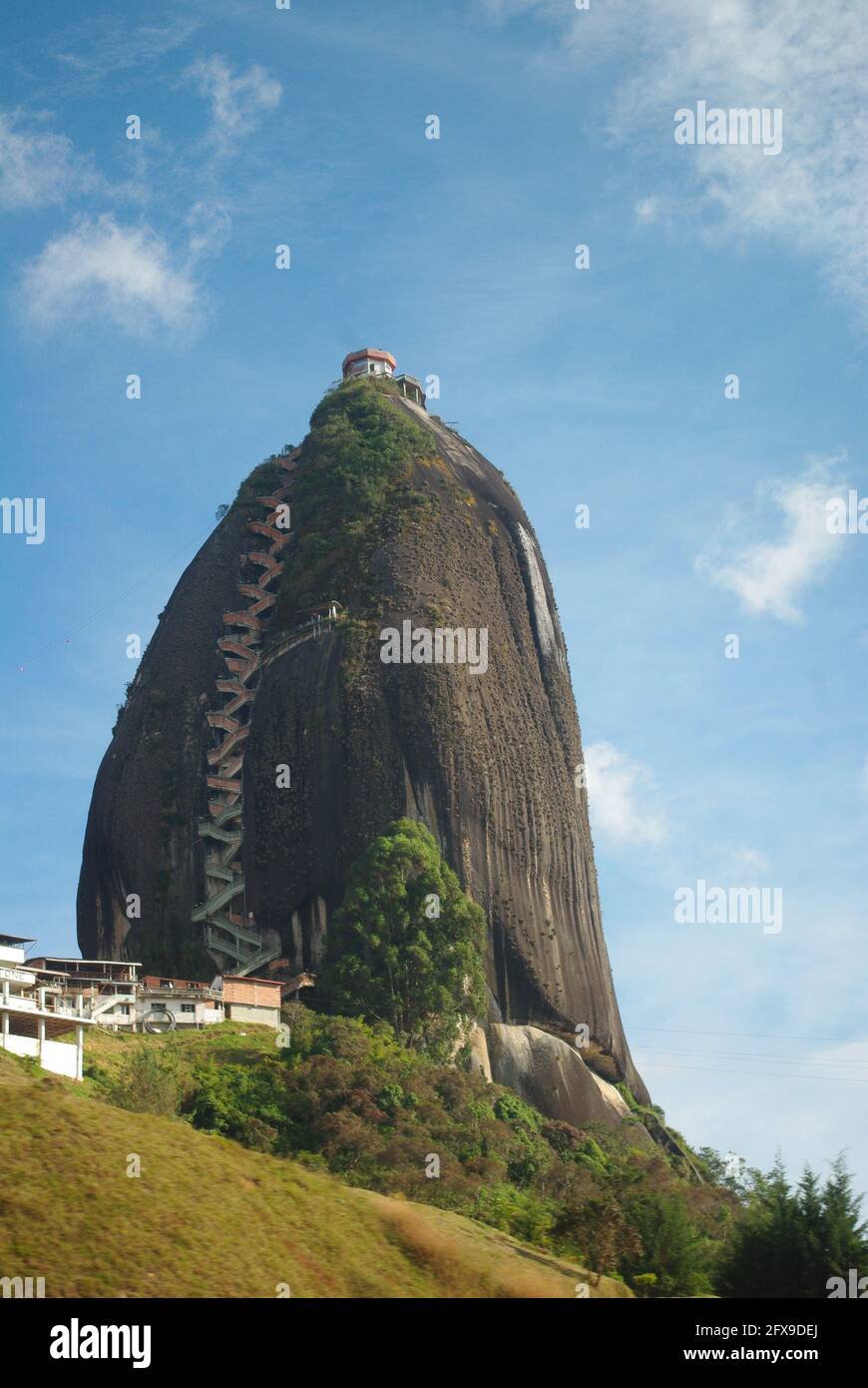 Zig-zag staircase mounting the 200 meter high granite rock formation, El Penon de Guatape, Guatape, Colombia Stock Photo