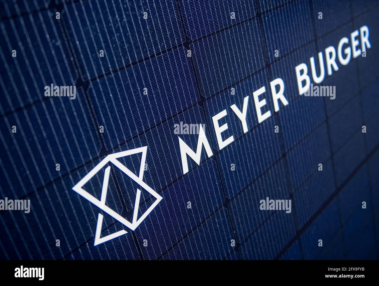 Freiberg, Germany. 26th May, 2021. A solar module at the Meyer Burger  Technology AG plant in Freiberg bears the group's name. The Swiss machine  manufacturer is now officially commissioning its plant in