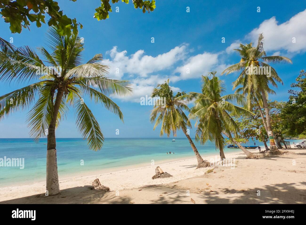 Amazing paradise Alona beach with palms in Bohol Panglao island, Philippines Stock Photo