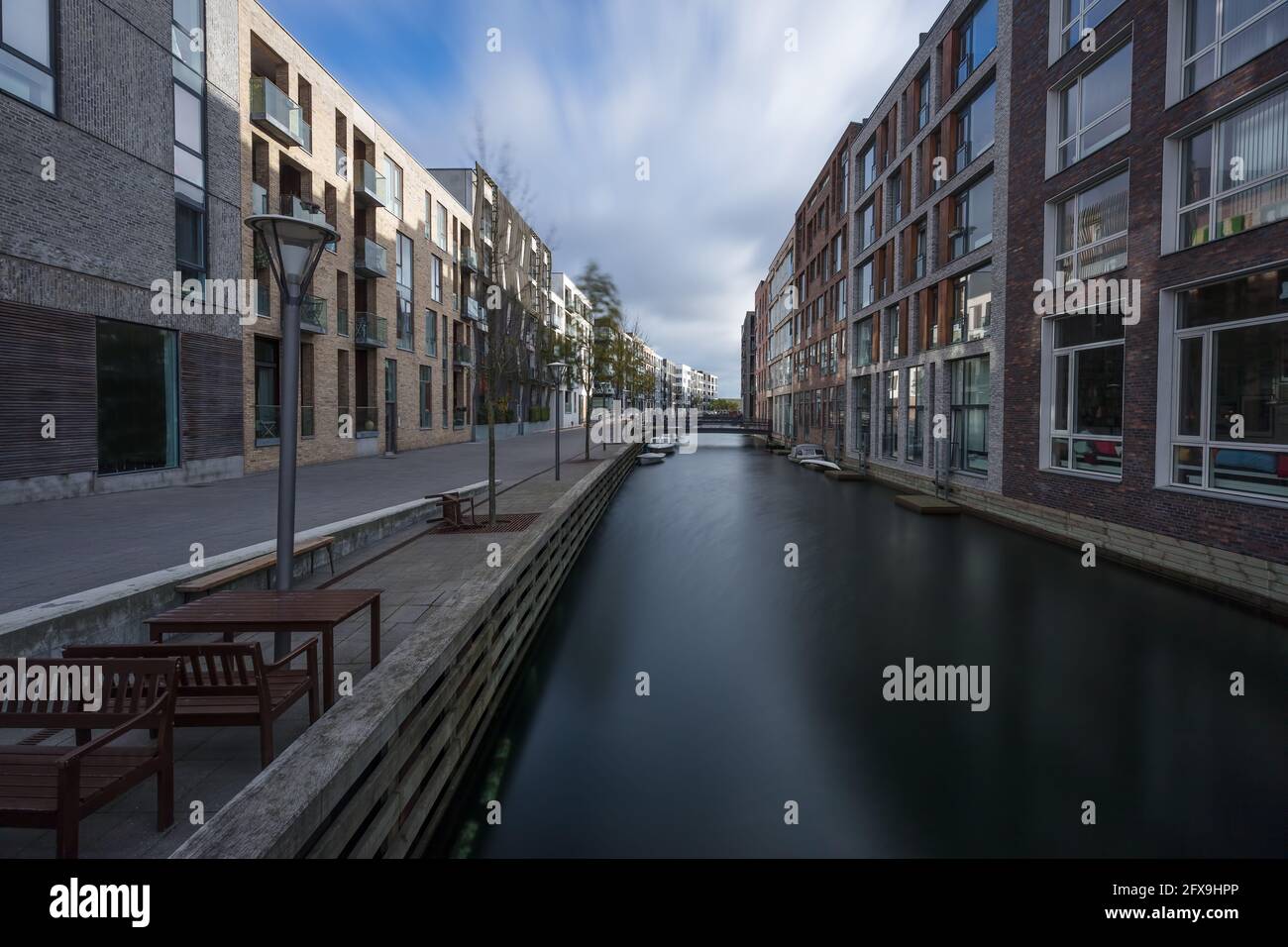 A canal in Sluseholmen a newly built apartment area in Copenhagen with water canals Stock Photo