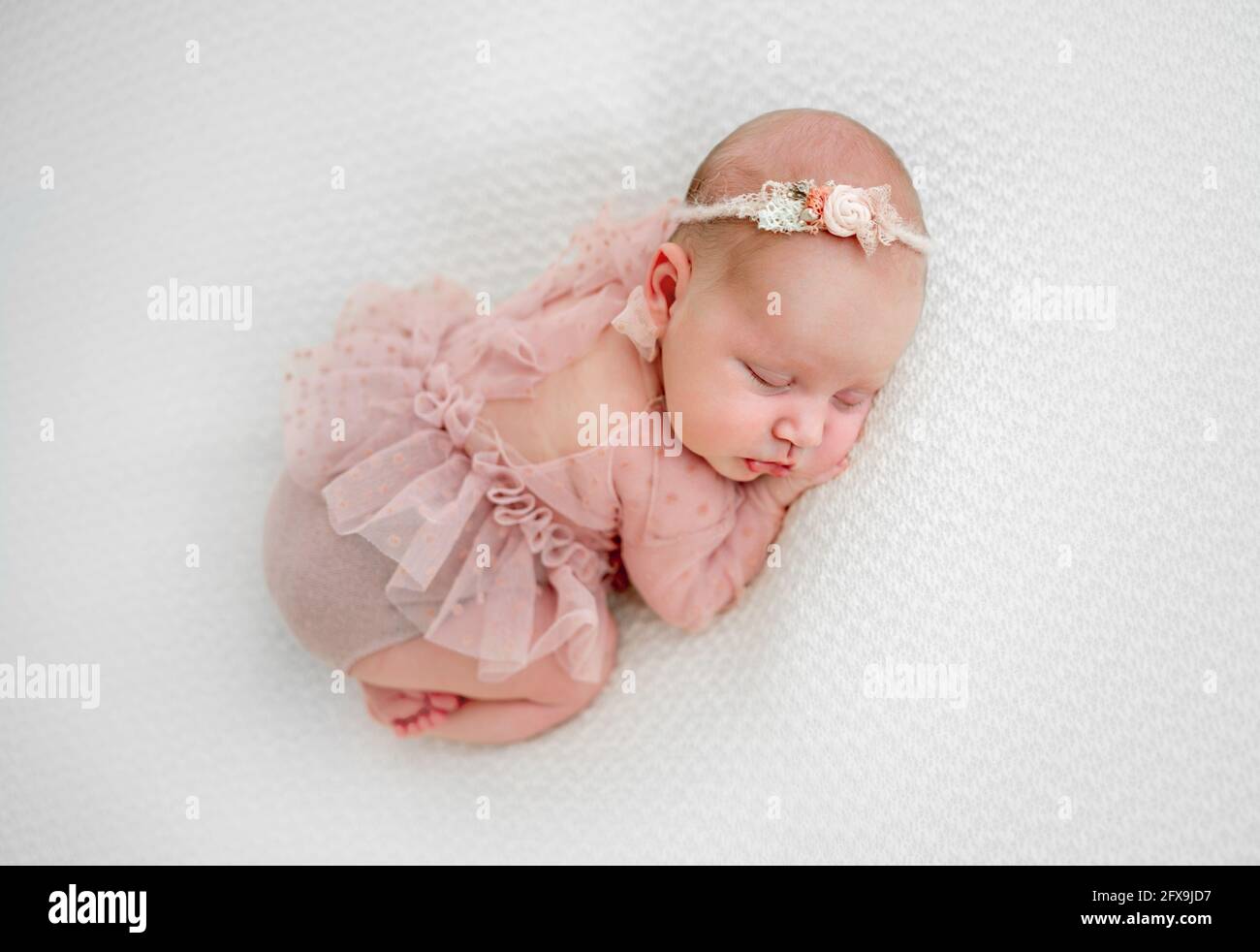 Newborn baby girl photoshoot Stock Photo