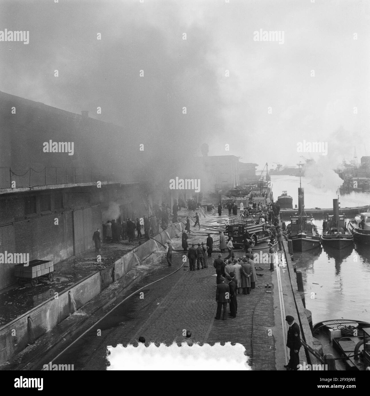 Fire Thomsens Port Authority Rotterdam, 28 September 1951, fires, The Netherlands, 20th century press agency photo, news to remember, documentary, historic photography 1945-1990, visual stories, human history of the Twentieth Century, capturing moments in time Stock Photo