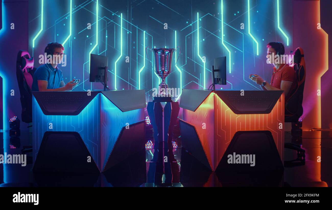 Two Professional Esport Gamers Using Controllers Playing Console Video