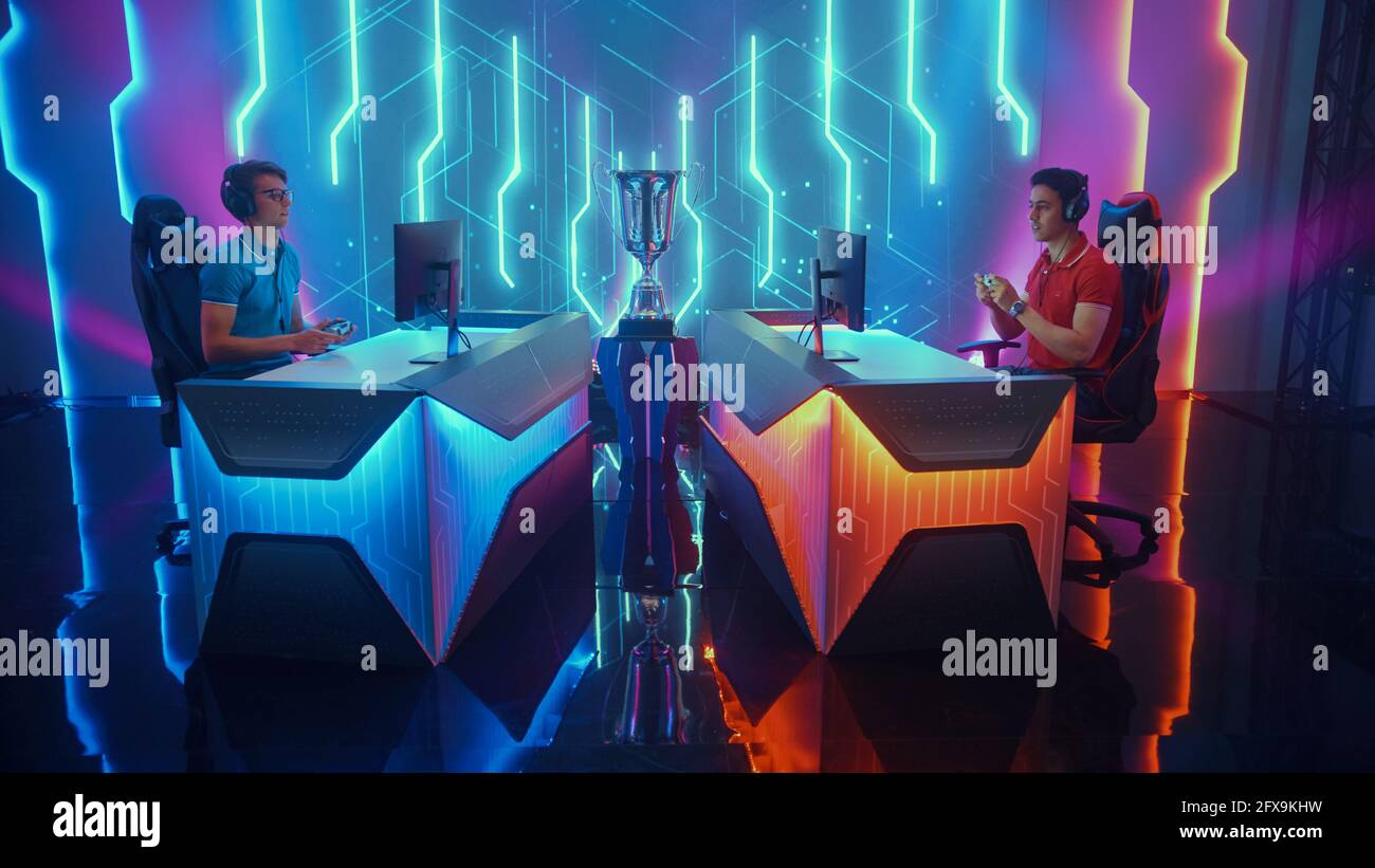 Two Professional Esport Gamers Using Controllers Playing Console Video