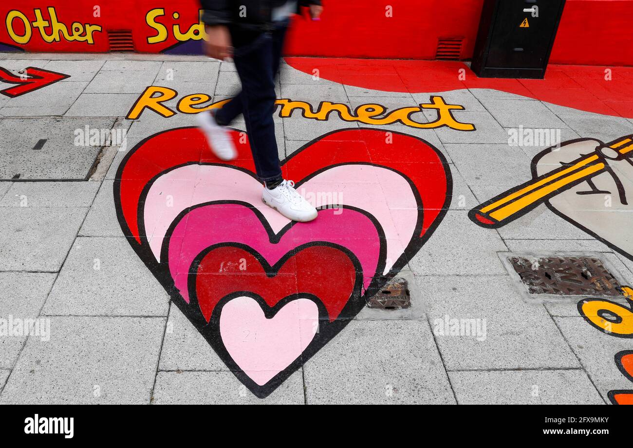 London, UK. 26th May, 2021. Photo taken on May 26, 2021 shows the artwork 'He(art) is Everywhere' near Tate Modern in London, Britain. New artworks of the project 'Beyond Boundaries' unveiled near Tate Modern. The artworks are aimed at reconnecting people with each other. Credit: Han Yan/Xinhua/Alamy Live News Stock Photo