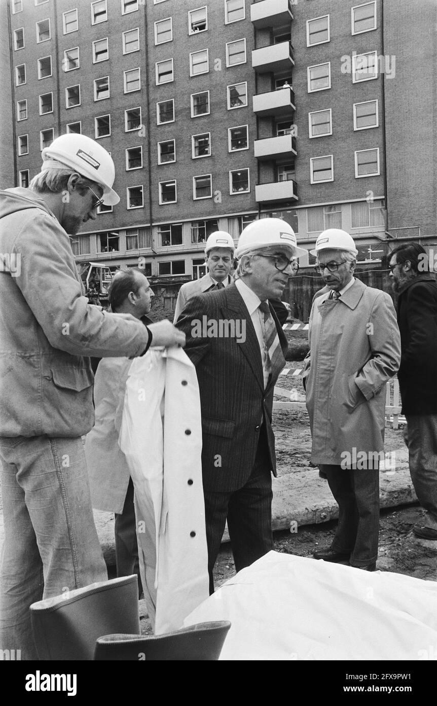 Mayor Polak strikes first pile for VU expansion Polak is helped into ...
