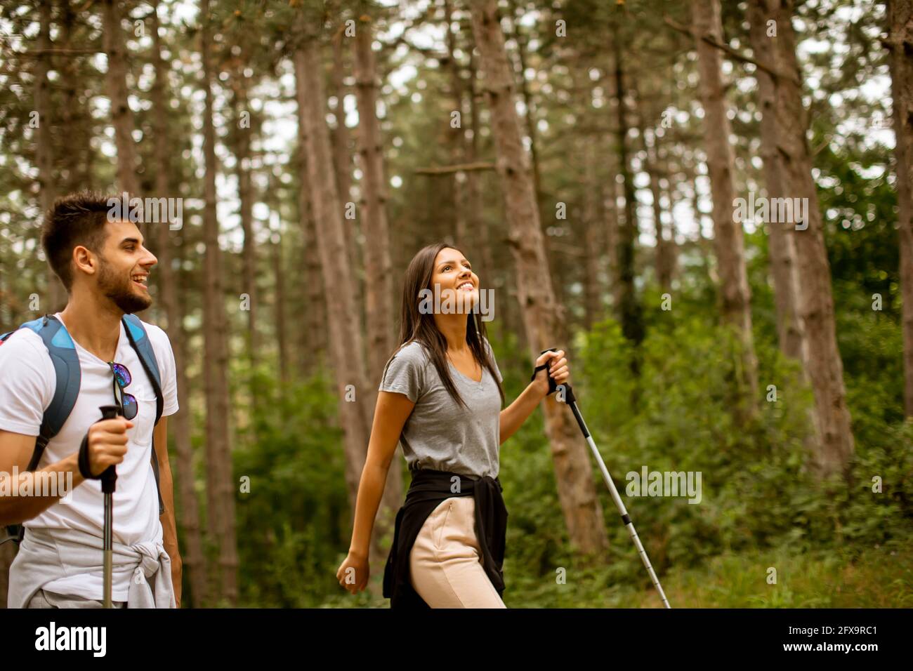 Man woman female couple walking hiking hi-res stock photography and ...