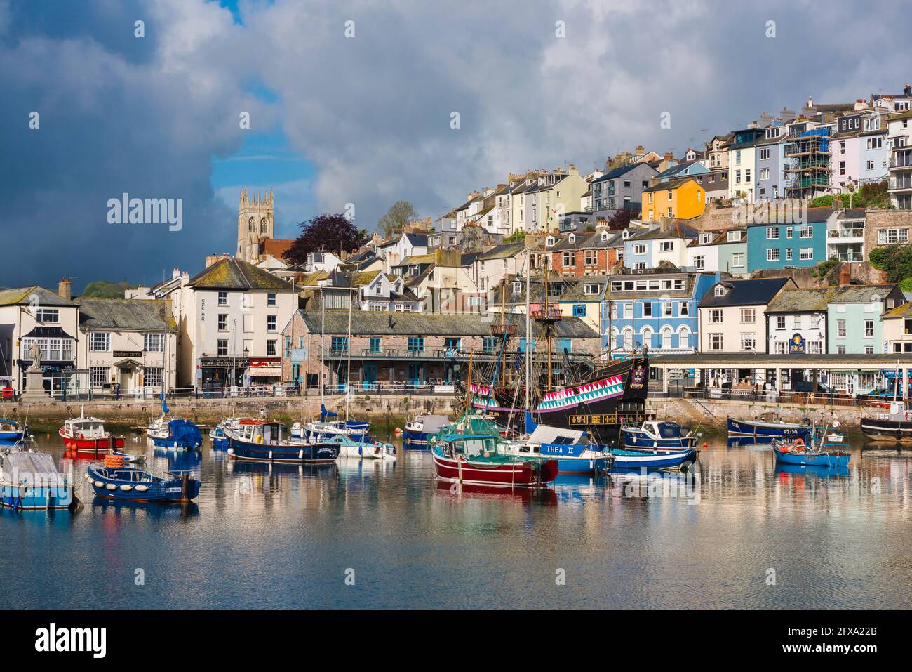 Devon UK, view of fishing boats moored in the harbour at Brixham, Torbay, Devon, south west England, UK Stock Photo