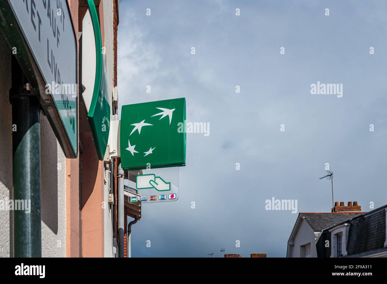 BNP PARIBAS Logo View on Front Store Facade of french Shop with brand signage in Pornic, France 20.5.2021 BNP PARIBAS is famous brand for banking and Stock Photo