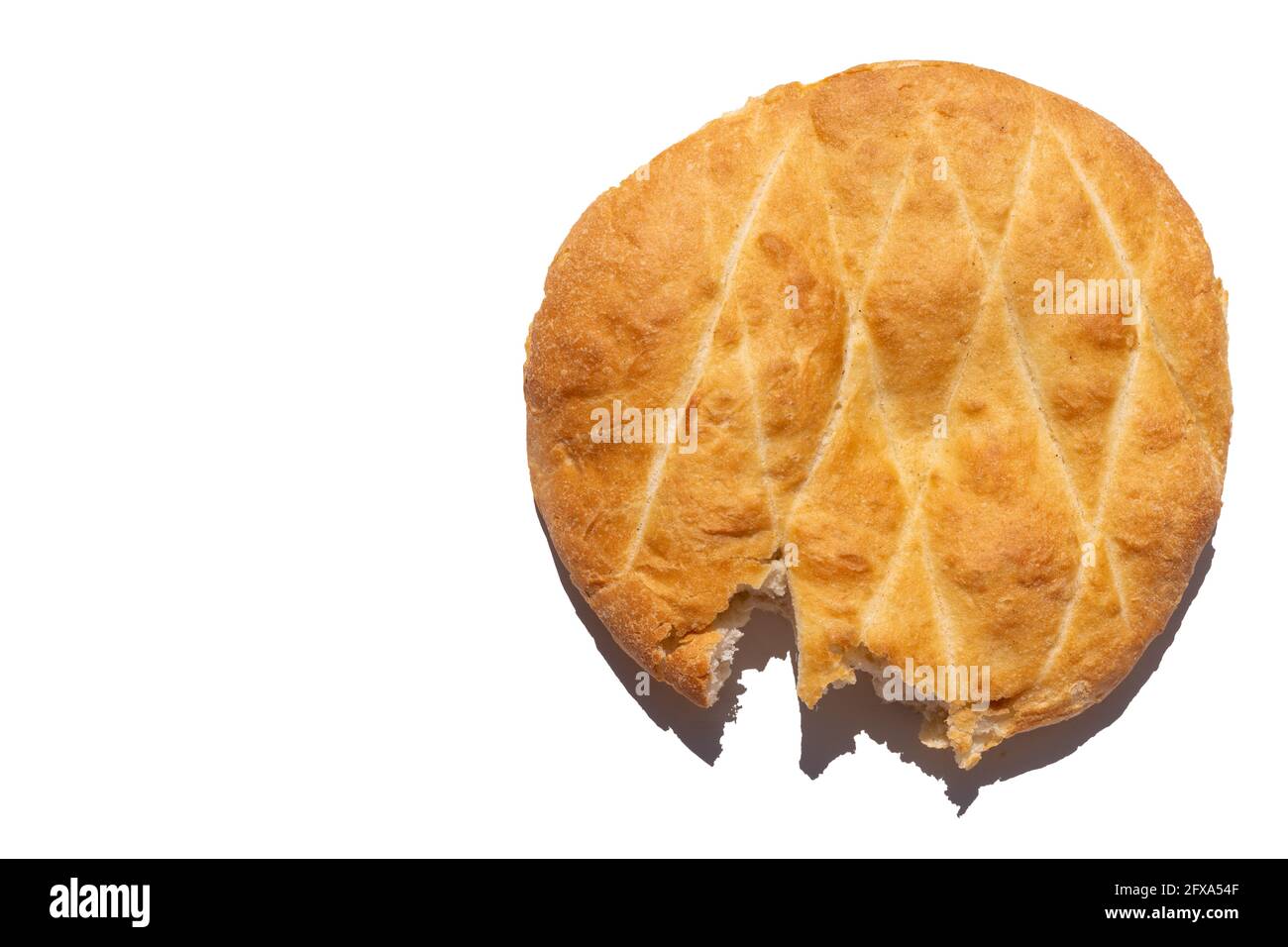 https://c8.alamy.com/comp/2FXA54F/freshly-baked-homemade-round-wheat-bread-broken-off-one-edge-isolated-on-white-background-top-view-copy-space-bitten-off-bread-healthy-food-concep-2FXA54F.jpg