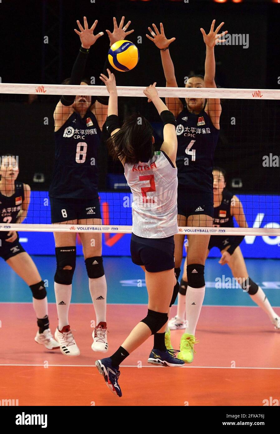 Rimini. 26th May, 2021. Koga Sarina (front) of Japan blocks during the Preliminary Round match between Japan and China at the 2021 FIVB Volleyball Nations League in Rimini, Italy, on May 26, 2021. Credit: Xinhua/Alamy Live News Stock Photo