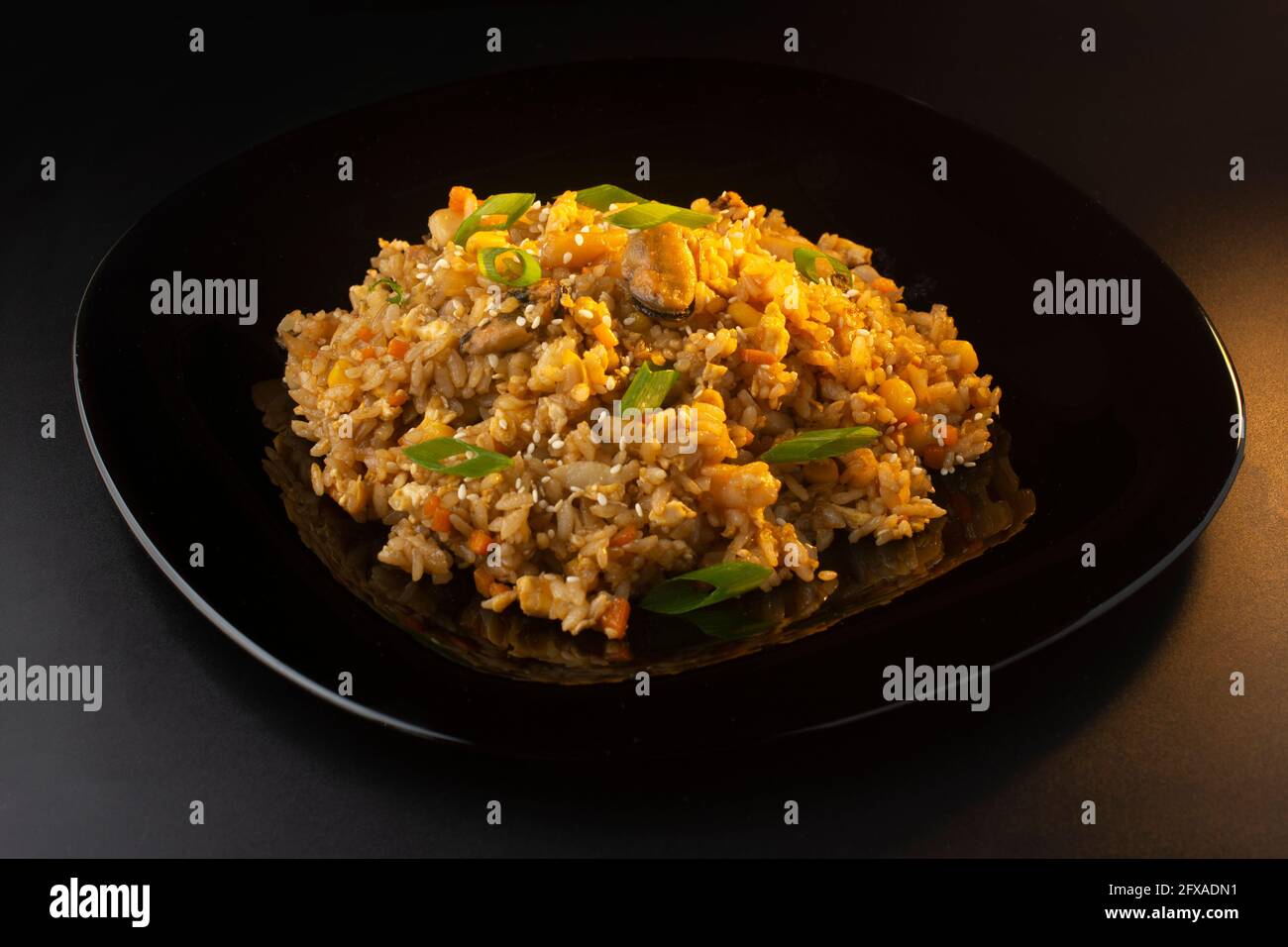chinese rice with mussels and squid Stock Photo - Alamy