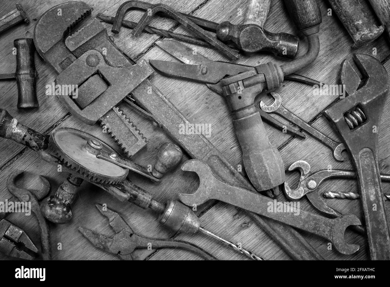 Vintage tools on a wooden background Stock Photo - Alamy
